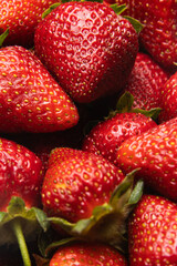 Red ripe strawberries background. Close up, top view.