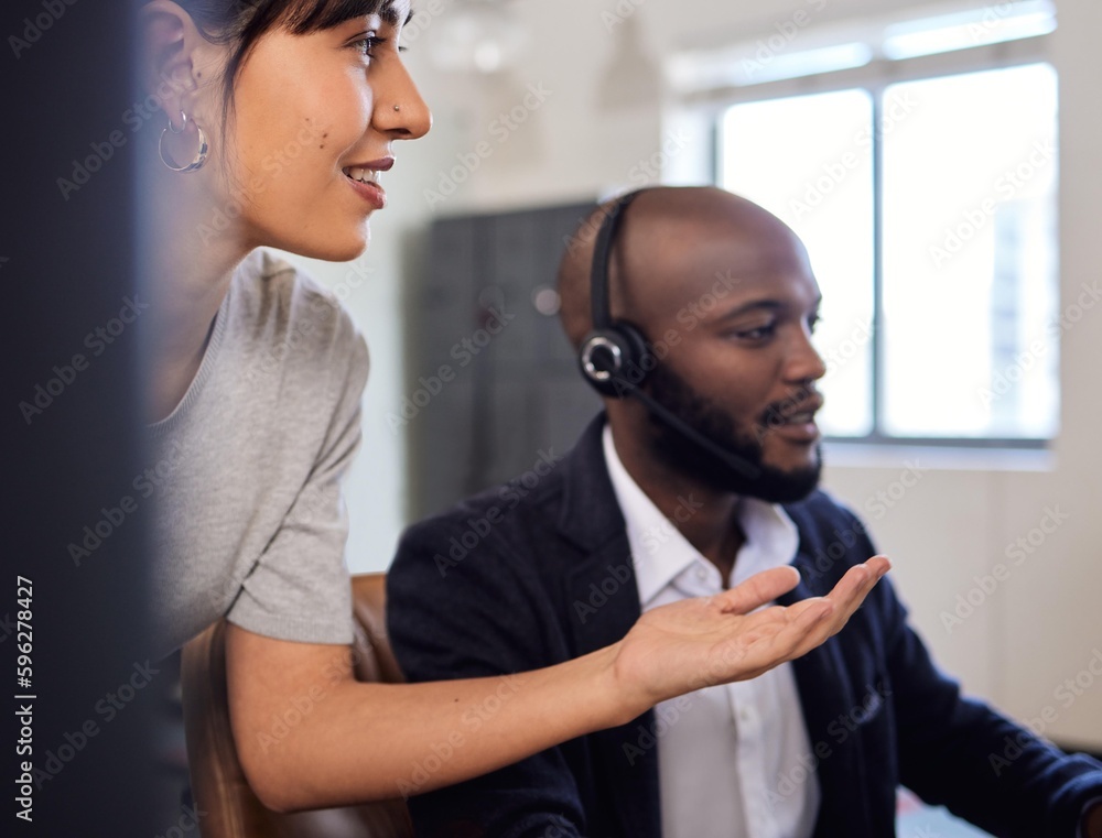 Poster Lets try and troubleshoot this together. Shot of two call centre agents working together in an office.