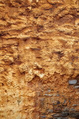 Detail of the brown rough facade