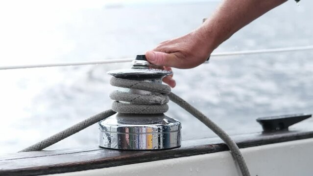 Close up yacht ropes on halyard winch on sailboat or on yacht
