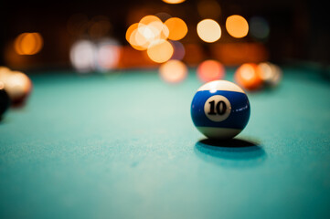 Closeup shot of a number 10 ball on a pool table