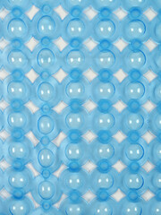 Polyvinyl chloride blue bathroom rug, top view