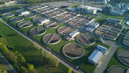 Aerial view of sewage treatment plant. - obrazy, fototapety, plakaty