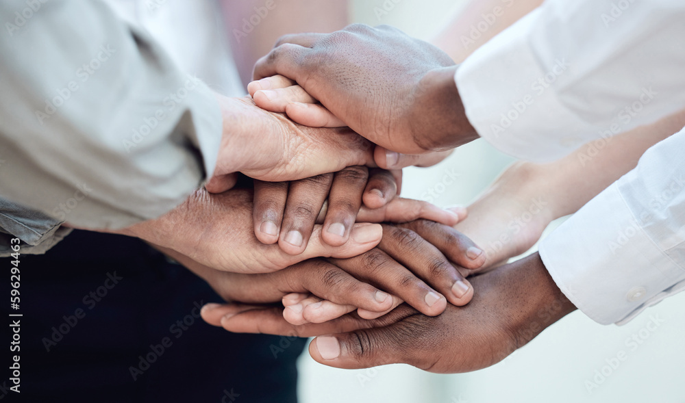 Poster Seldom has anything of greatness been the result of a solo effort. Shot of a group of unrecognizable businesspeople standing with their hands stacked.