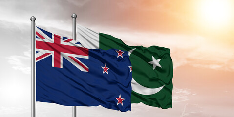 Flags of Pakistan and new zealand friendship flag waving on the sky with beautiful sky.