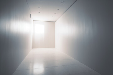 a long white hallway with a light coming in from the window. Generative Ai