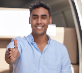 Thank you for making use of our services. Closeup shot of a delivery man extending a handshake while loading boxes from a van.