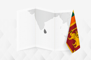 A grayscale map of Sri Lanka with a hanging Sri Lankan flag on one side. Vector map for many types of news.