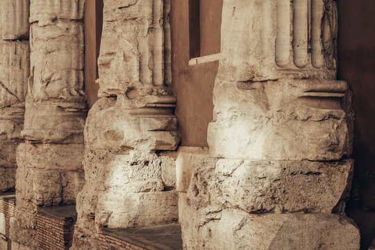 Roman pillar. Detail of the Temple of Hadrian on the Campus Martius in Rome, Italy. Antique marble column of Templum Divus Hadrianus, also Hadrianeum. Travel and history concept. Italian architecture.