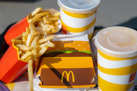 tray full of fast food in McDonalds Restaurant, Big Mac Menu with McDonalds logo box, Cheeseburger, French fries, Cola, 23.03.20 Kemer Turkey.
