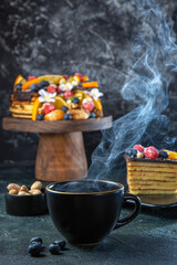front view delicious fruit cake with cup of tea dark background tea pie dessert sweet biscuit cake dough