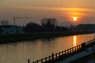 Beautiful sunset view in Padua and reflections on River Bacchiglione; Veneto, Italy