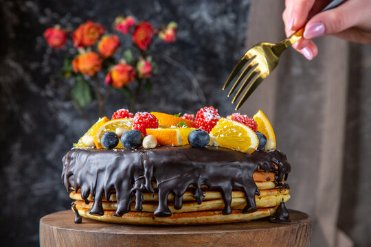 front view yummy chocolate cake with fresh fruits on dark background dough cake dessert sweet biscuit pie