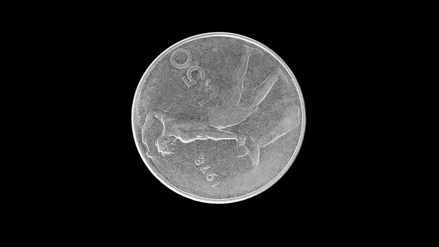 Reverse of Italy coin 50 lire isolated in black background. 4k video
