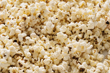 Closeup of scattered popcorn with hard lighting