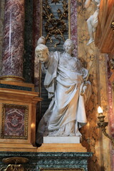 Statue of Judith at the Santi Ambrogio e Carlo al Corso Basilica in Rome, Italy