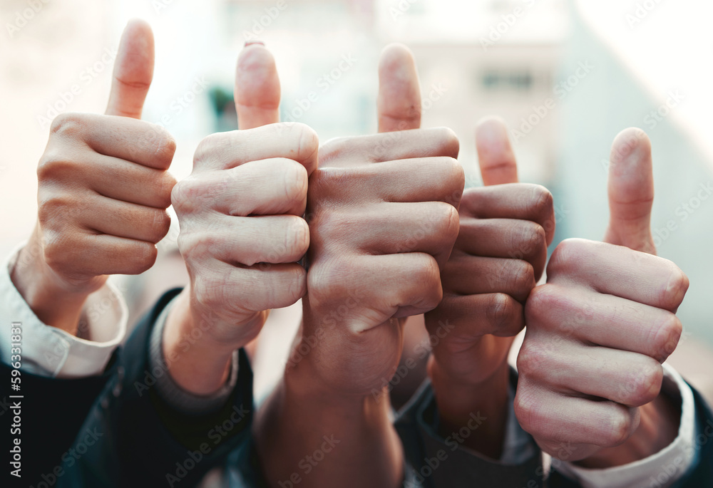 Poster were all on board. cropped shot of a group of unrecognizable businesspeople showing a thumbs up.