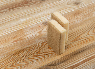 Natural Sponge on Wooden Table, Eco Brown Sponges, Eco Friendly Hygiene Accessory, Scotch Brite Dishwasher