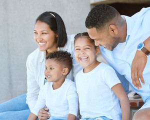 Ill put my money on forever. Shot of a beautiful young family bonding outside.