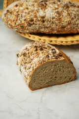 Fresh bread with oatmeal flakes and sunflower