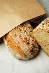 Fresh bread with oatmeal flakes and sunflower