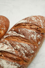 Fresh baguette bread, close-up. French loaf of bread