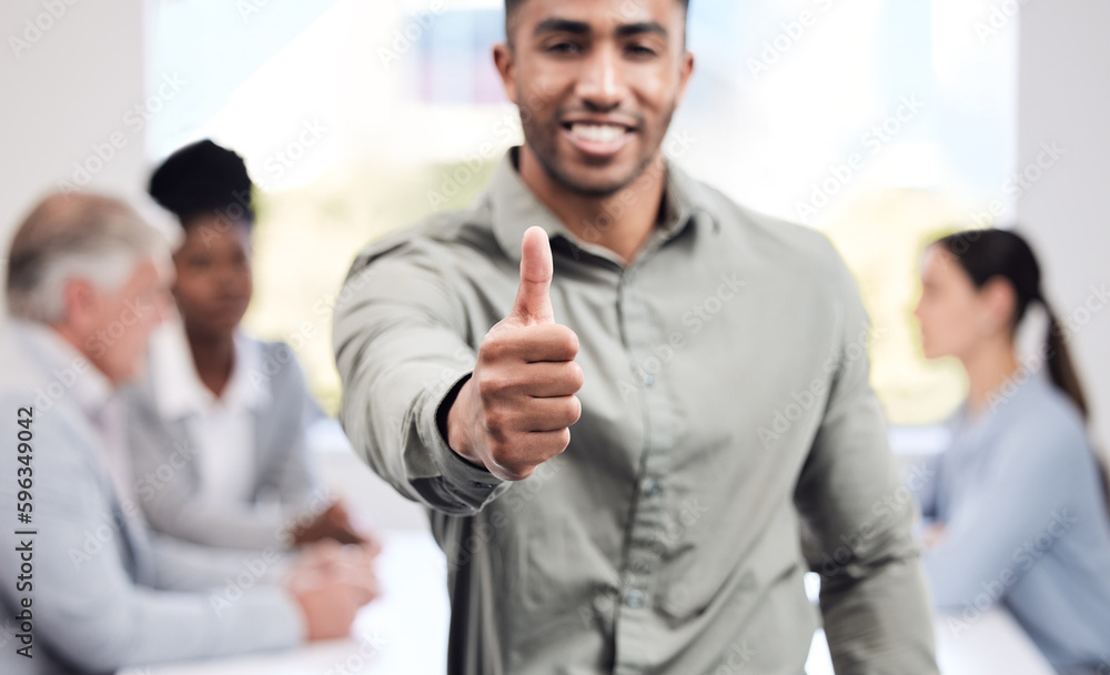 Sticker Expect nothing but the best from him. Portrait of a young businessman showing thumbs up in an office with his colleagues in the background.