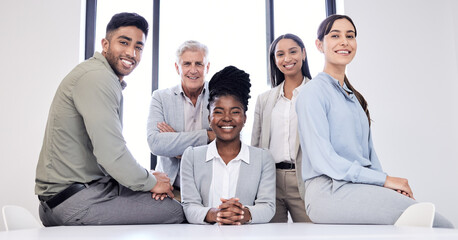 Success is all a part of our day. Portrait of a group of confident businesspeople in an office.
