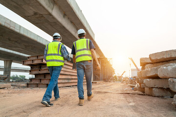 Asian Two Specialists Inspect Commercial at Road Construction Site, Industrial Building...