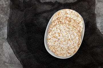 Few crunchy rice cakes on white dish
