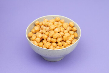 Ceramic bowl full of chickpeas, boiled and drained