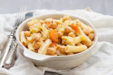 Cooked chick peas with cabbage, carrot in bowl