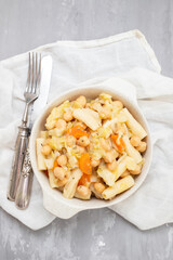 Cooked chick peas with cabbage, carrot in bowl