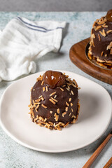 Chestnut and chocolate cake. Delicious cake with cream filling. Studio shoot. Bakery products