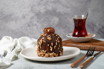 Chestnut and chocolate cream cake. Delicious cake with cream filling. Studio shoot. Bakery products