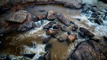 beautiful arial drone view of water spring passing through rocks in nature landscape HD