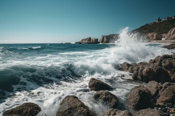 Fototapeta na wymiar A beach with waves, a cliff, blue sky and ocean. Generative AI
