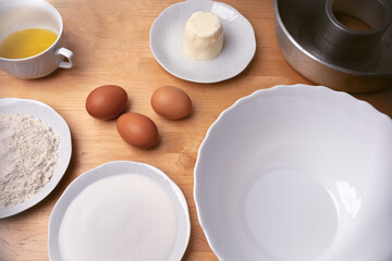 Obraz na płótnie Canvas Ingredients to prepare a lemon cake. Homemade cake