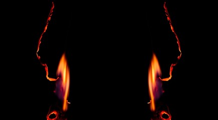 burning paper, glowing edge of paper on a black background