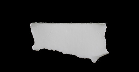 a white piece of paper on a black isolated background