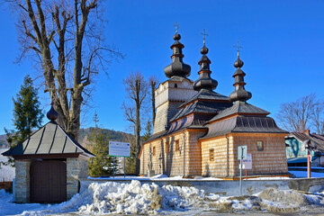 Orthodox wooden church in winter time, Wysowa Zdroj, Low Beskids (Beskid Niski), Poland - obrazy, fototapety, plakaty