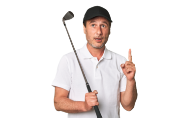Middle aged golfer man pointing upside with opened mouth.
