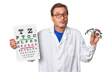 Experienced optometrist conducts eye exam with care, holding visual acuity test and prescription glasses.
