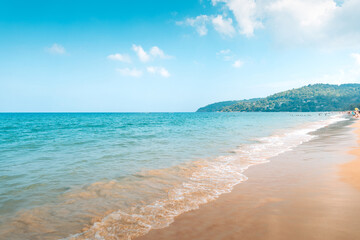 Beach, sea and sky at a sunny day on a tropical island