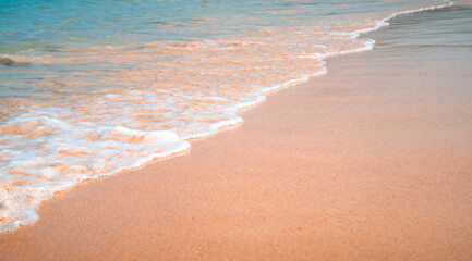 Beach, sea and sky at a sunny day on a tropical island