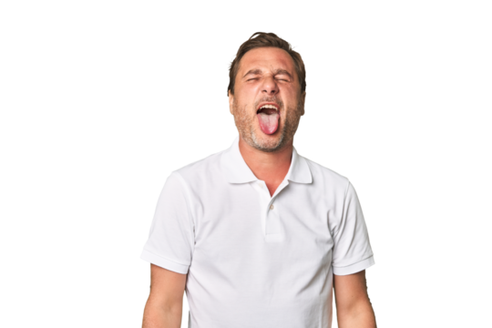 A middle-aged man isolated funny and friendly sticking out tongue. - Powered by Adobe