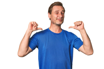 A middle-aged man isolated feels proud and self confident, example to follow.