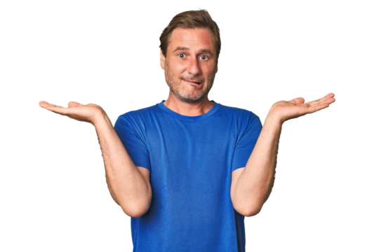 A middle-aged man isolated confused and doubtful shrugging shoulders to hold a copy space.