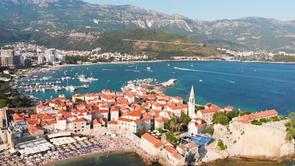 Aerial view of Budva, old and modern city on Adriatic Sea coast. Center of Montenegrin tourism and popular sea resort.