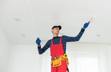 Construction worker ceiling work. working on repairs